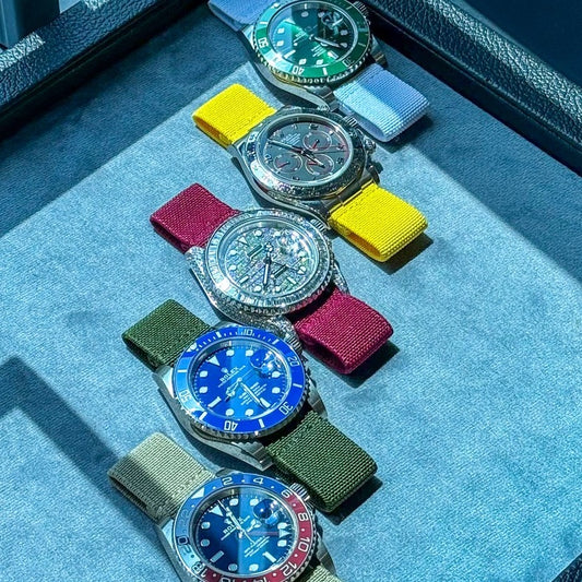 Watch collection on assorted straps displayed in a case – Artisan Watch Co.