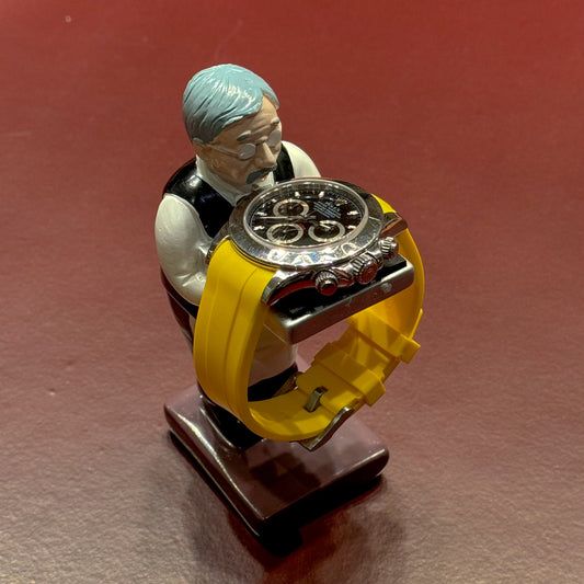 Butler watch holder displaying a Daytona watch with yellow strap – Artisan Watch Co.